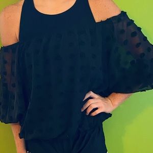 Black off the shoulder polka-dotted shirt
